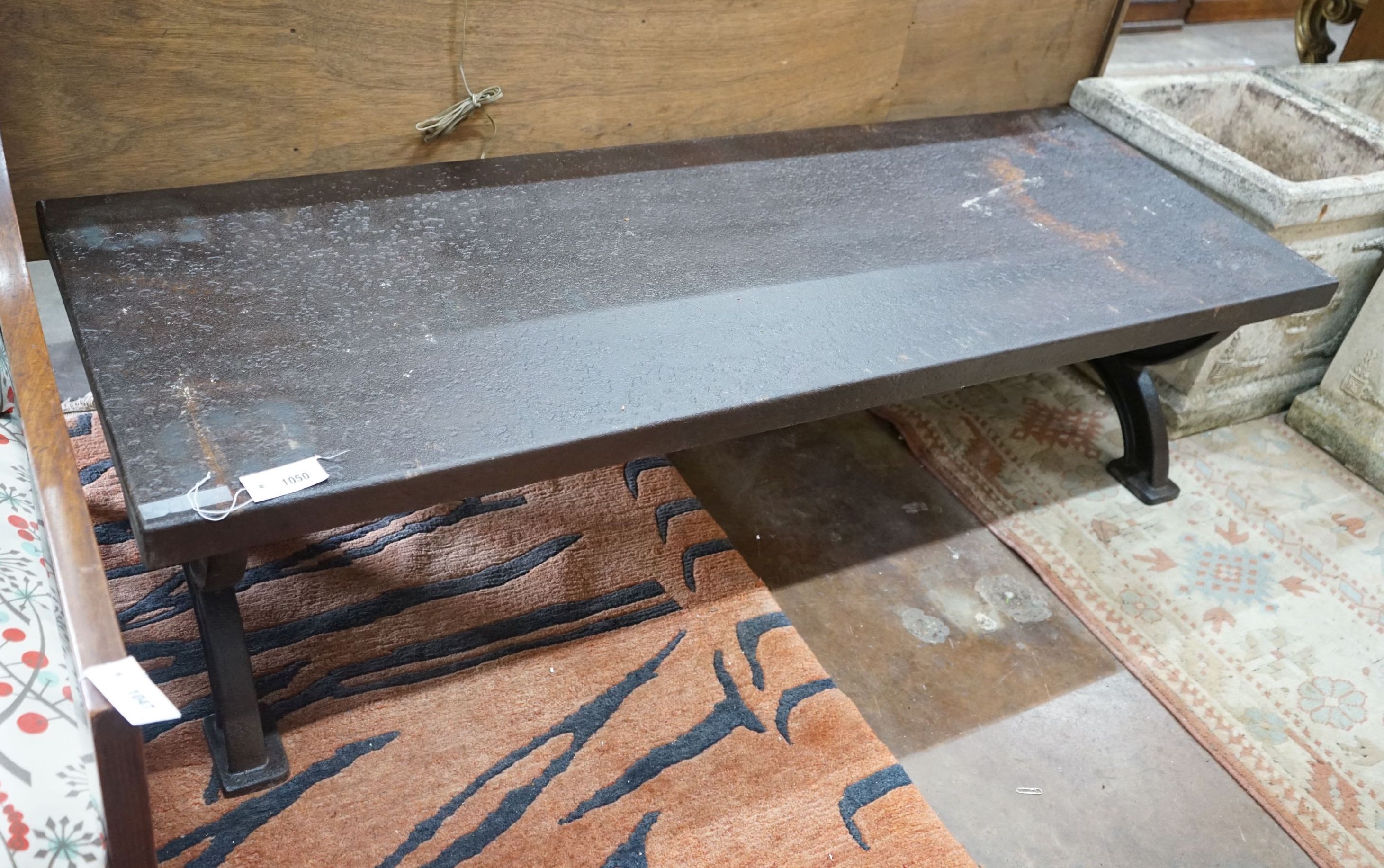 An industrial style rectangular cast iron low table, length 169cm, depth 60cm, height 45cm